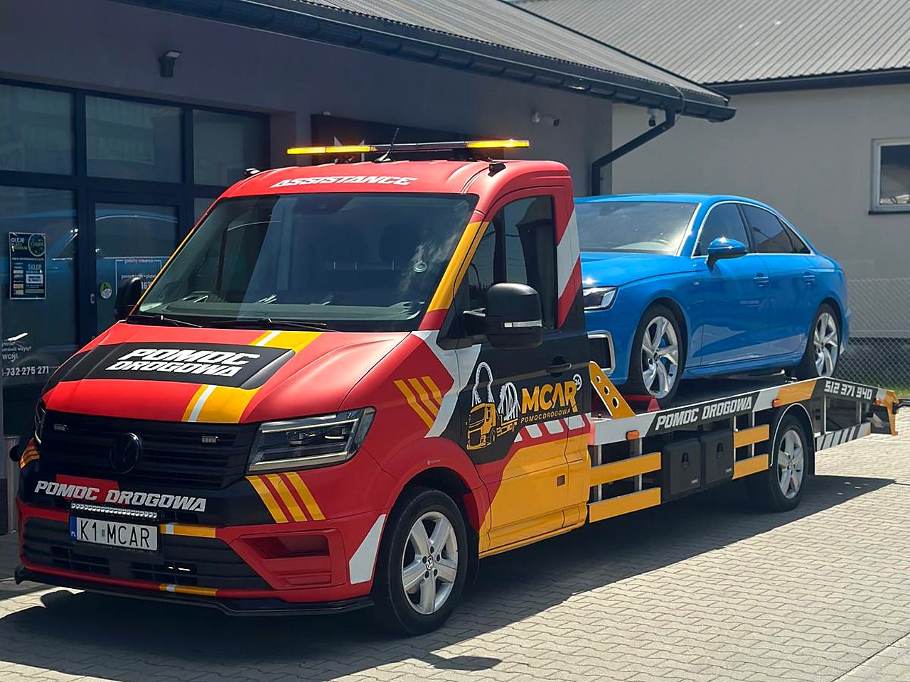 Laweta M-Car z autem klienta